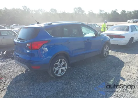 2019 Ford Escape Titanium z USA, uszkodzony, nr VIN 1FMCU0J92KUA58519